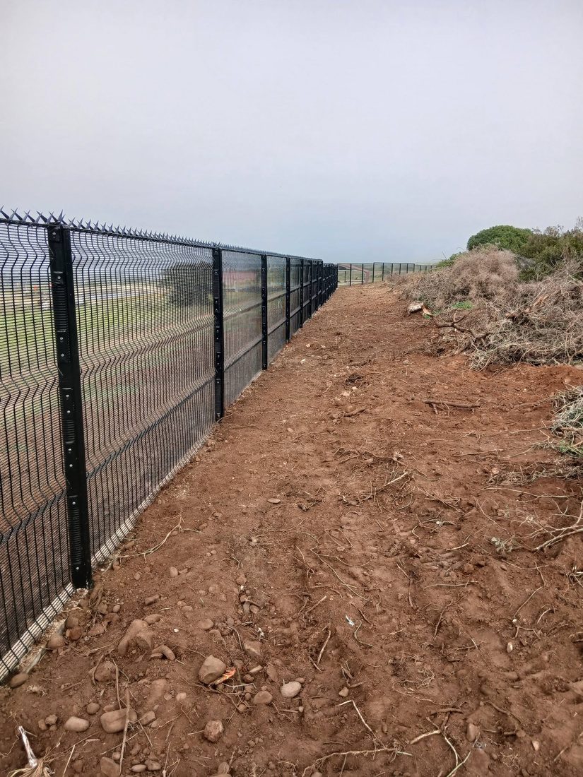 Completed spike-topped Clearview perimeter fence at the Hartenbos wastewater works