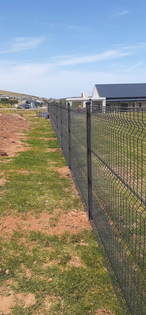 Clearview perimeter fencing running along the King's College field, Hartenbos